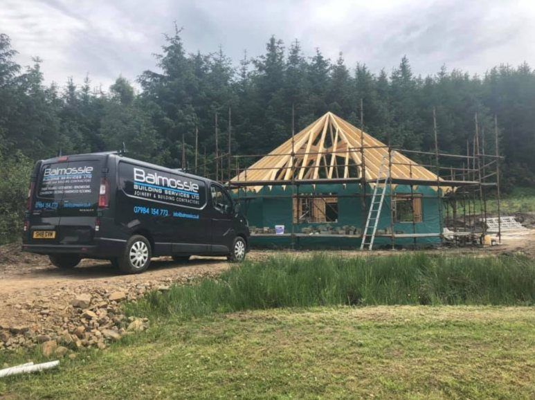 The Balmossie van parked beside a building with its octagonal roof being framed